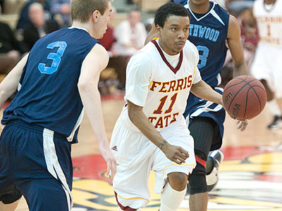 FSU's Darien Gay handles the ball last year against Northwood (Photo by Ed Hyde)